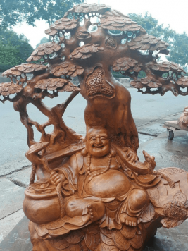 Di Lặc ngồi gốc tùng - Gỗ Hương 81cm x 72cm x 40cm