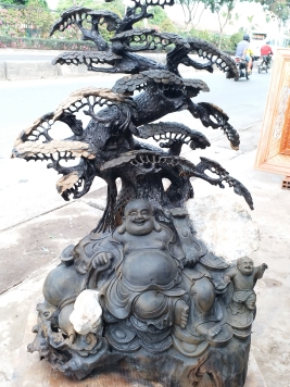 Di Lạc ngồi gốc tùng.  Gỗ Mun Sừng  quý hiếm.  Kt 106cm 68cm 50cm