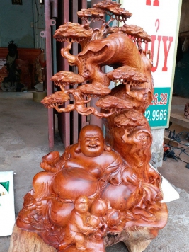 Di Lac ngồi gốc tùng. Gỗ hương việt. Kt 88cm 55cm 40cm 