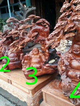 Di lặc ngồi gốc cây