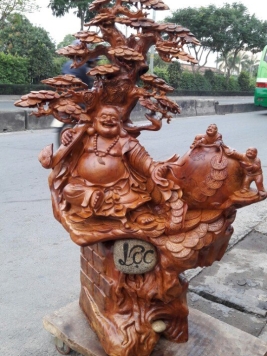 Di Lặc kéo bao tiền - Gỗ hương - 138cm x 90cm x 50cm